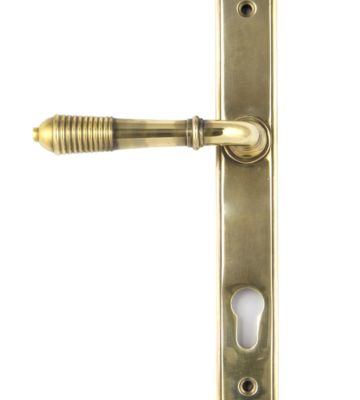 From The Anvil Aged Brass Reeded Slimline Lever Espag. Lock Set