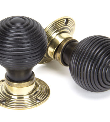 From The Anvil Ebony Mortice/Rim Beehive Knob Set – Aged Brass Roses