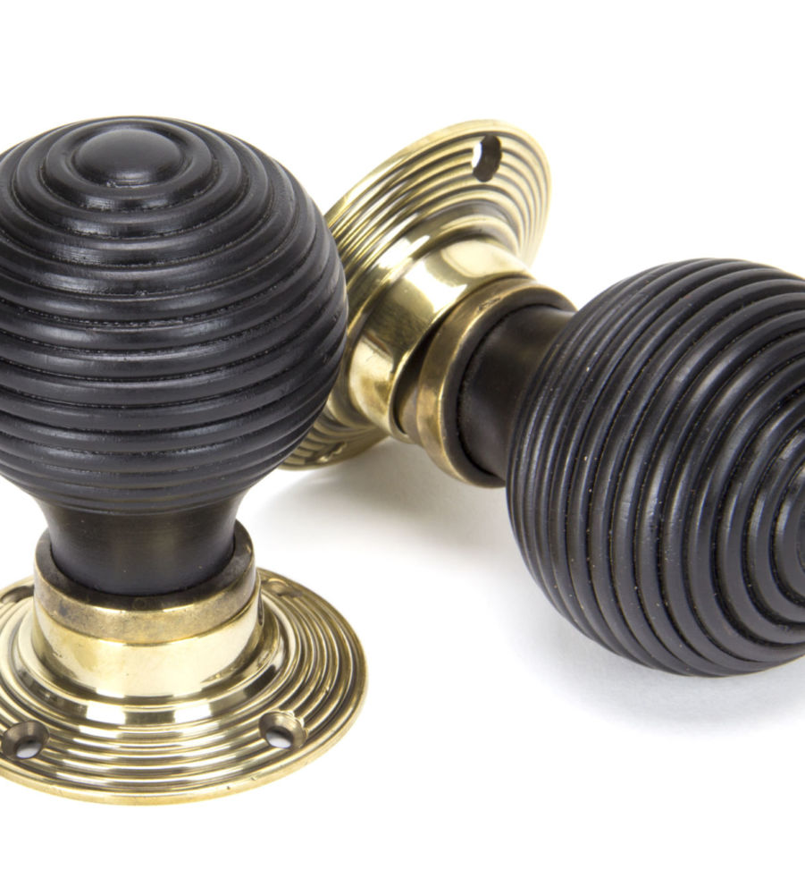 From The Anvil Ebony Mortice/Rim Beehive Knob Set - Aged Brass Roses