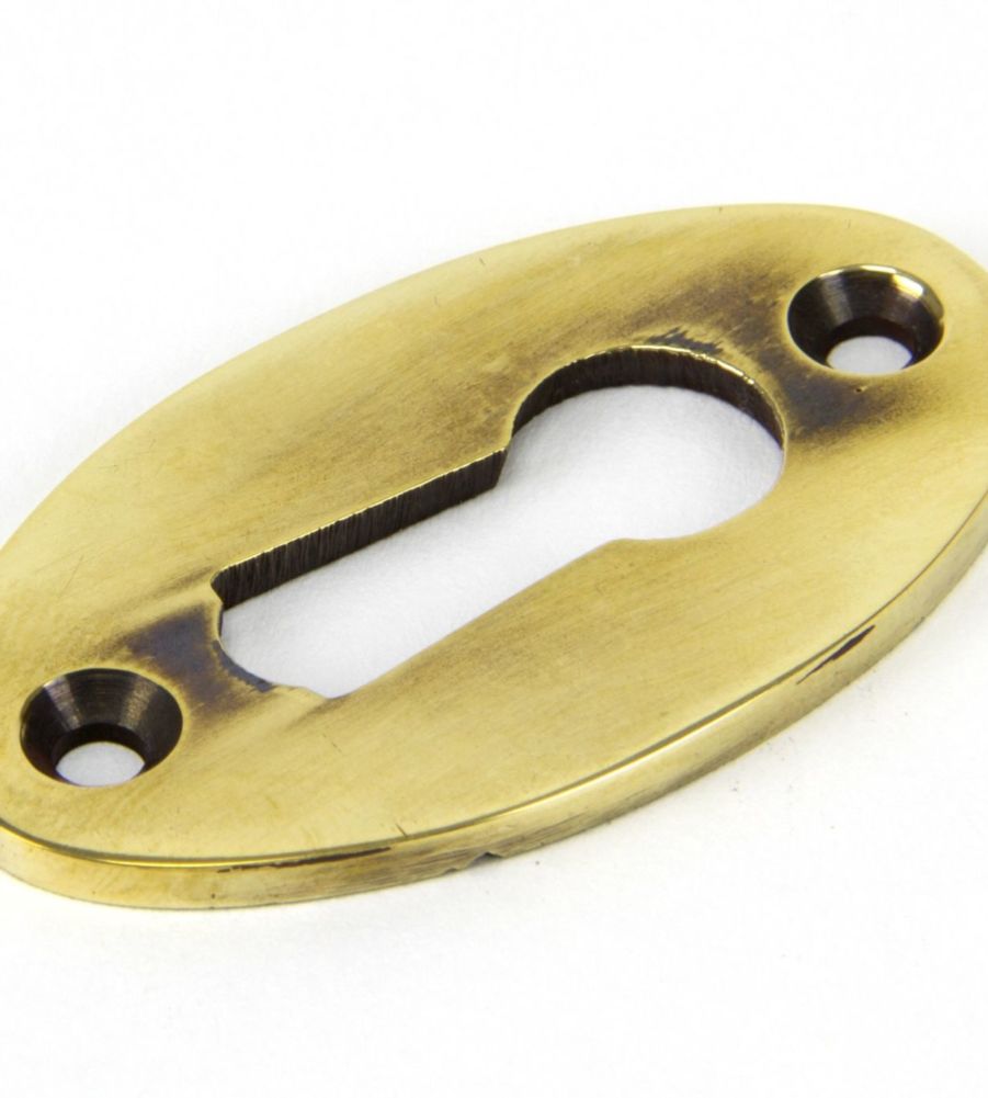 Aged Brass Oval Escutcheon