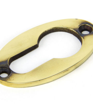 From The Anvil Aged Brass Oval Euro Escutcheon