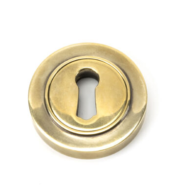 From The Anvil Aged Brass Round Escutcheon (Plain)