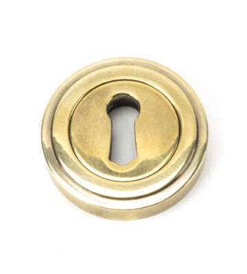 From The Anvil Aged Brass Round Escutcheon (Art Deco)