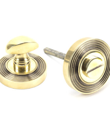 From The Anvil Aged Brass Round Thumbturn Set (Beehive)