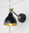 From The Anvil Smooth Brass Brindley Wall Light in Elan Black